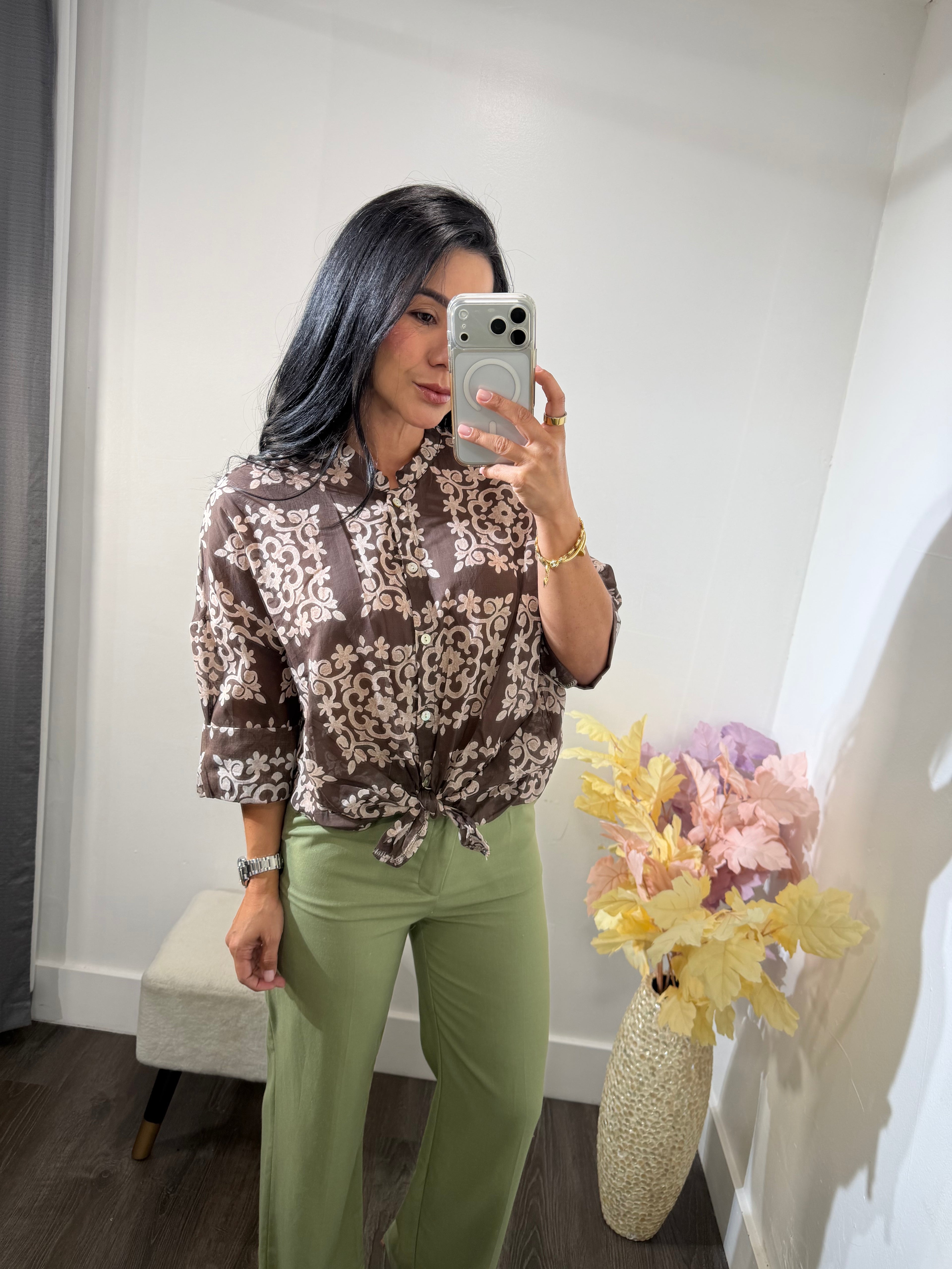 Top button Marcela