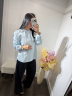 Top button Paula